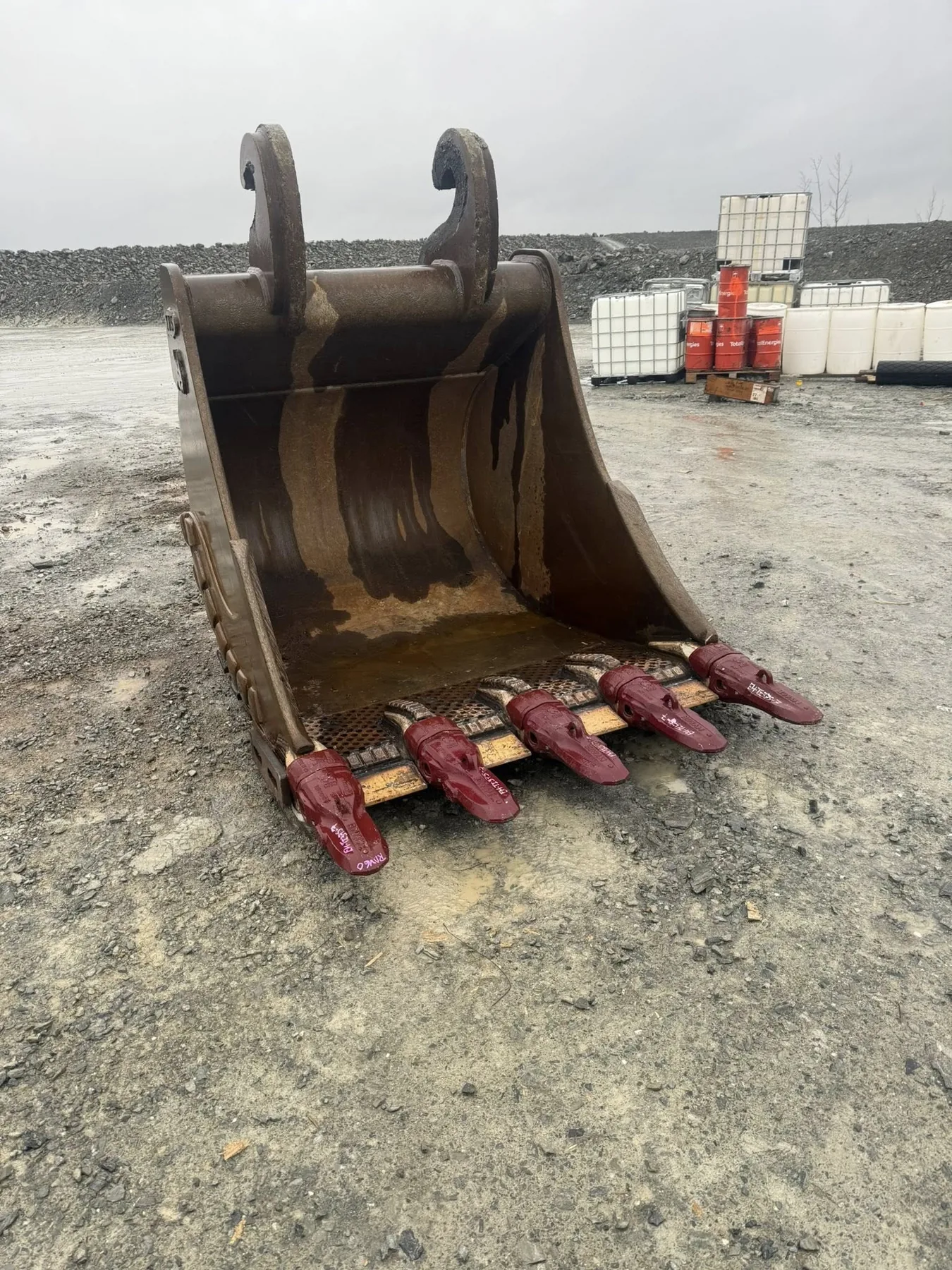 Bucket attachment repair in yard